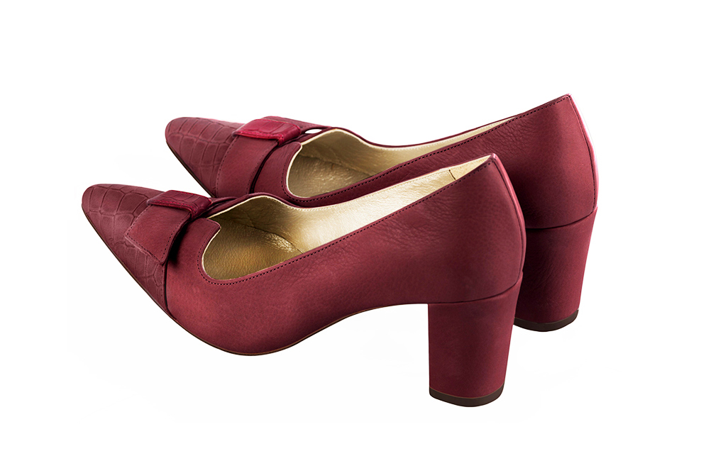 French elegance and refinement for these burgundy red dress pumps, with a knot on the front, 
                available in many subtle leather and colour combinations. Possibility to customize with your colors and materials.
With its original cutout, this pretty fitted pump
will render you great services, combining comfort and distinction. 
                Matching clutches for parties, ceremonies and weddings.   
                You can customize these shoes to perfectly match your tastes or needs, and have a unique model.  
                Choice of leathers, colours, knots and heels. 
                Wide range of materials and shades carefully chosen.  
                Rich collection of flat, low, mid and high heels.  
                Small and large shoe sizes - Florence KOOIJMAN